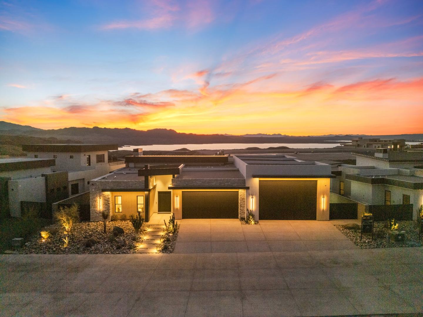 Aerial front elevation at sunset with Lake Havasu on the horizon