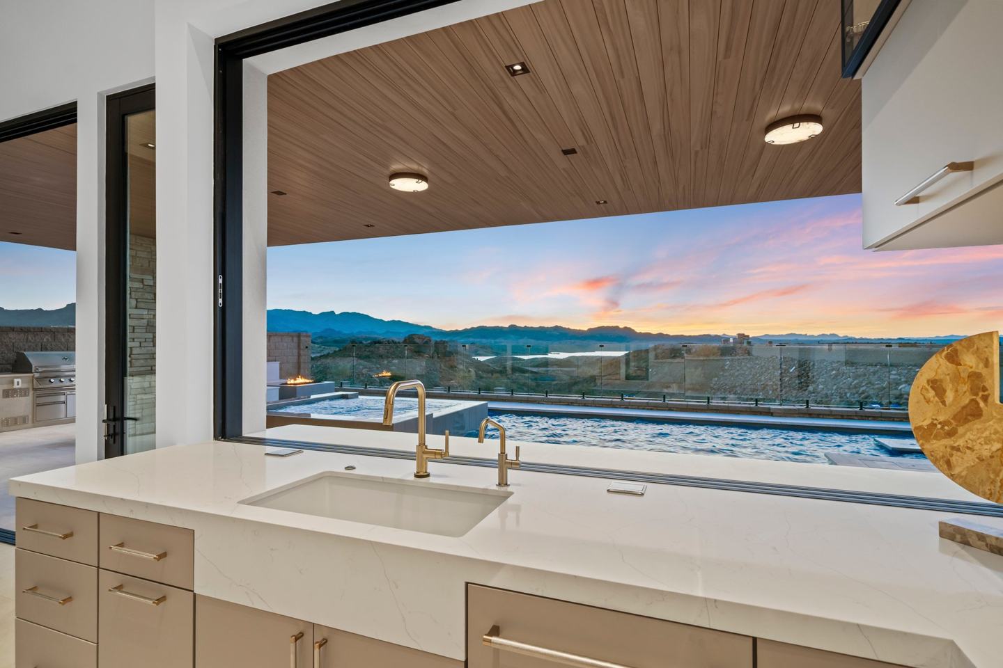 Open kitchen with a marble slab backsplash