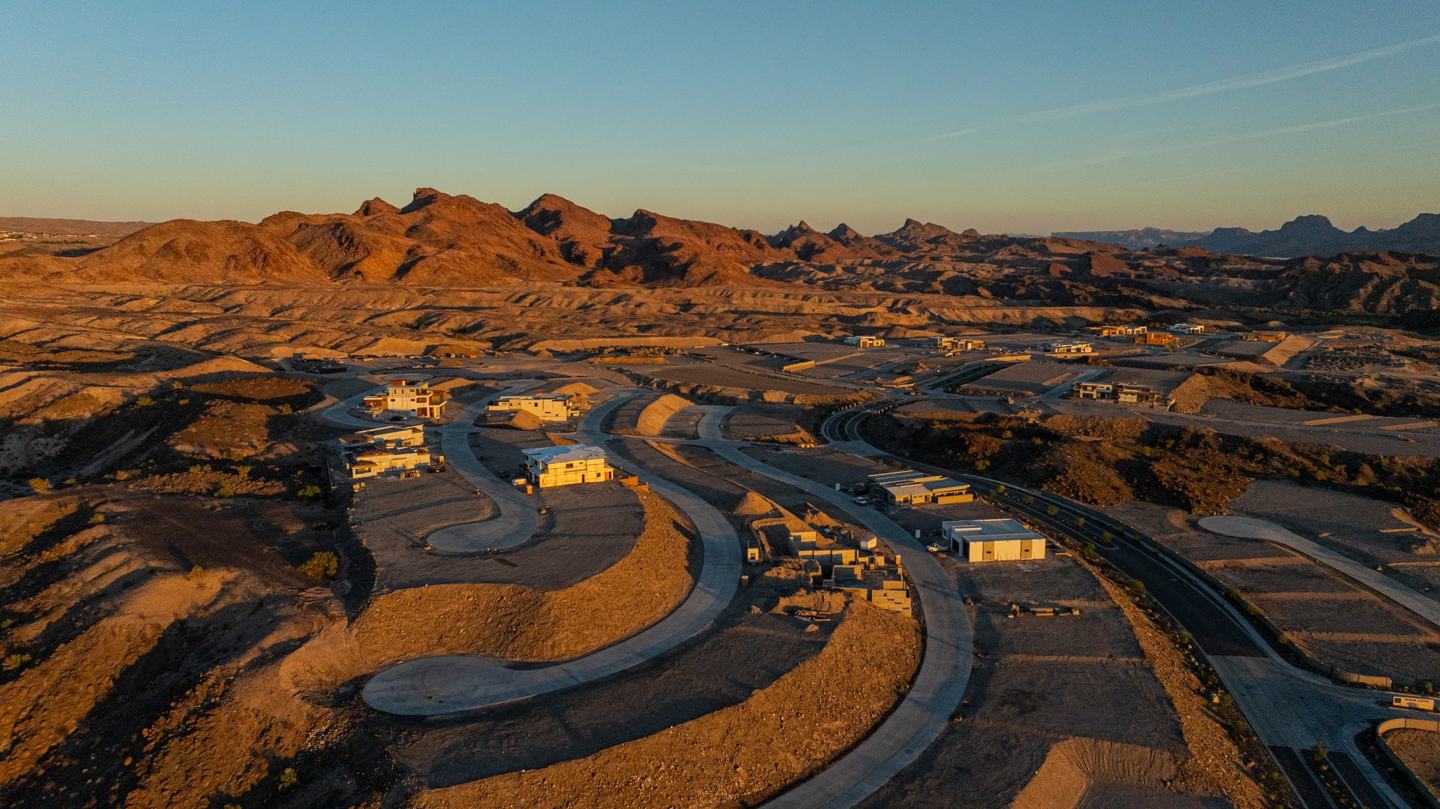 Riviera Lake Havasu at golden hour, homesites terraced into the desert landscape