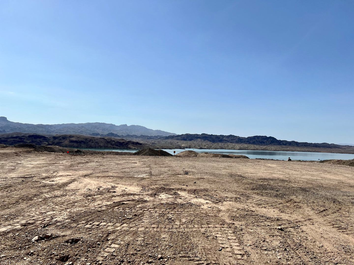 Wide desert and lake views from a graded homesite at The Ridge